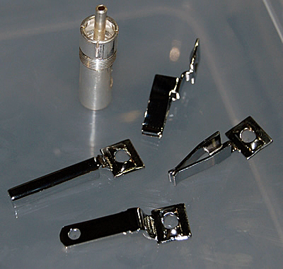 metal parts for the AC plug